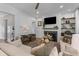 Comfortable living room featuring a fireplace, plush seating, natural light, and stylish accents at 3873 Newhall St, Mount Pleasant, SC 29466