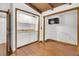 Compact kitchen area offers a sink, cabinets, microwave, and wood floors; ready for simple cooking needs at 394 Shoofly Rd, Ridgeville, SC 29472