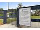 Foxbank Plantation dog park requirements posted on sign near gate to ensure safe use at 404 Ambergate Ln, Moncks Corner, SC 29461