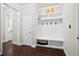 Functional mudroom featuring built-in storage, seating, and hooks for organization at 404 Ambergate Ln, Moncks Corner, SC 29461