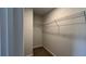 Well-lit walk-in closet featuring carpet flooring and wire shelving at 405 Mistflower Ln, Moncks Corner, SC 29461