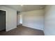 Bedroom featuring plush carpeting, a closet, and light-colored neutral paint at 407 Mistflower Ln, Moncks Corner, SC 29461