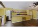 Open basement layout with a small bar and ceiling fans; ready to be transformed at 4120 Veritas St, Charleston, SC 29414