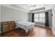 Spacious bedroom with hardwood floors and tray ceilings offers a peaceful retreat at 4120 Veritas St, Charleston, SC 29414