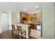 Modern kitchen featuring granite countertops, stainless steel appliances, and a breakfast bar with barstool seating at 4120 Veritas St, Charleston, SC 29414