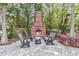 Inviting outdoor fire pit area with comfortable seating and a cozy ambiance at 45 Sycamore Ave # 116, Charleston, SC 29407