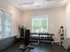 Resident gym featuring free weights, a punching bag, and fitness equipment at 45 Sycamore Ave # 116, Charleston, SC 29407