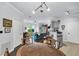 Bright living space with hardwood floors, open layout, and seamless transition to the kitchen and dining areas at 45 Sycamore Ave # 116, Charleston, SC 29407