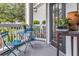 Cozy patio features a bistro table and chairs, perfect for relaxing outdoors at 45 Sycamore Ave # 116, Charleston, SC 29407