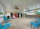 Outdoor patio with ceiling fans, vending machine, black iron fence and plenty of seating at 45 Sycamore Ave # 116, Charleston, SC 29407