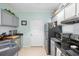 Well-equipped kitchen with stainless steel appliances and ample counter space at 45 Sycamore Ave # 536, Charleston, SC 29407