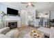 Spacious living room featuring a cozy fireplace, open layout, and modern furnishings at 45 Sycamore Ave # 536, Charleston, SC 29407