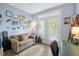 Inviting living space with a cozy couch, natural light, and decorative accents at 45 Sycamore Ave # 536, Charleston, SC 29407