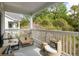Relaxing outdoor patio with comfortable seating and a beautiful view of lush greenery at 45 Sycamore Ave # 536, Charleston, SC 29407