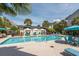 Resort-style pool area with cabanas and comfortable seating for relaxing and enjoying the sunshine at 45 Sycamore Ave # 536, Charleston, SC 29407