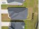 Aerial view of a single-Gathering home showcasing its roof and landscaping within a residential neighborhood at 603 Dunswell Dr, Summerville, SC 29486