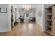 Bright and spacious home office with large windows, modern decor, and wood flooring at 603 Dunswell Dr, Summerville, SC 29486
