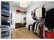 Organized walk-in closet featuring ample shelving, hanging space, and wood flooring at 603 Dunswell Dr, Summerville, SC 29486