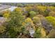 Aerial view of the home, yard, and river reveals a patio and a private dock at 630 Cain Dr, Mount Pleasant, SC 29464