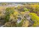 Aerial view of the property reveals a spacious backyard deck and mature trees at 630 Cain Dr, Mount Pleasant, SC 29464