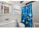 Bright bathroom with a vanity sink and playful shower curtain at 630 Cain Dr, Mount Pleasant, SC 29464