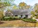 Charming home featuring a brick accent, neutral siding, and well-manicured front yard at 630 Cain Dr, Mount Pleasant, SC 29464