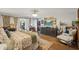 Bright and airy main bedroom features a walk-in closet, sitting area, and hardwood floors at 630 Cain Dr, Mount Pleasant, SC 29464