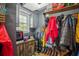Mud room with storage cabinets, hanging racks, and patterned floors at 630 Cain Dr, Mount Pleasant, SC 29464