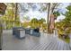 Spacious outdoor kitchen with modern appliances and a grill, perfect for entertaining on the deck at 630 Cain Dr, Mount Pleasant, SC 29464
