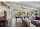 Spacious sunroom with a pool table, seating, and multiple windows offering abundant natural light at 630 Cain Dr, Mount Pleasant, SC 29464