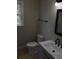 Bathroom featuring a modern sink and vanity, toilet, and a window for natural light at 708 Old State Rd, Goose Creek, SC 29445