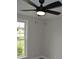 A bedroom featuring neutral walls, ceiling fan, and a window at 708 Old State Rd, Goose Creek, SC 29445
