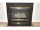 Fireplace with elegant black stone finish at 708 Old State Rd, Goose Creek, SC 29445