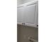 Laundry room featuring upper white cabinets and modern hardware at 708 Old State Rd, Goose Creek, SC 29445