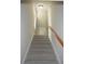 Carpeted stairs leading to the upper level of the home at 708 Old State Rd, Goose Creek, SC 29445