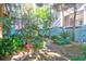 Picturesque backyard with brick patio, vibrant greenery, and tranquil atmosphere, perfect for relaxing or entertaining outdoors at 78 Society St, Charleston, SC 29401