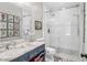 Stylish bathroom featuring marble countertops, a glass shower, and modern fixtures at 78 Society St, Charleston, SC 29401