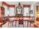 Charming dining room features classic wood furniture, a decorative chandelier, and a cozy atmosphere at 78 Society St, Charleston, SC 29401