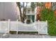 Charming home with double porches and a picket fence, offering a welcoming and secure entrance at 78 Society St, Charleston, SC 29401