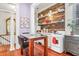 Cozy kitchen with exposed brick, open shelving, and classic appliances at 78 Society St, Charleston, SC 29401