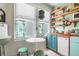 Vintage-inspired kitchen with open shelving, unique appliances, and bright natural light at 78 Society St, Charleston, SC 29401
