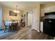 Dining room with chandelier, decor and view to the bathroom at 7870 Nummie Ct, North Charleston, SC 29418