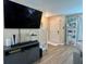 Cozy living room with stylish floors, a media console, and plenty of space at 7870 Nummie Ct, North Charleston, SC 29418