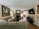 Spacious living room featuring a sectional couch, fireplace, and modern fixtures at 7870 Nummie Ct, North Charleston, SC 29418