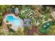 Resort amenities including a pool, mini golf course, and playground, surrounded by lush greenery at 816 Club Cottage Rd, Edisto Beach, SC 29438