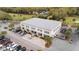 Commercial building with ample parking and attractive landscaping, located near a golf course at 816 Club Cottage Rd, Edisto Beach, SC 29438