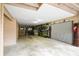 Spacious garage featuring ample storage, kayak racks, and convenient access to both interior and exterior spaces at 816 Club Cottage Rd, Edisto Beach, SC 29438