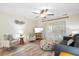 Relaxing living area with comfortable seating, light wood-look flooring, and stylish decor at 816 Club Cottage Rd, Edisto Beach, SC 29438