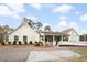 Charming exterior view of the restaurant with a covered patio and inviting entrance at 816 Club Cottage Rd, Edisto Beach, SC 29438