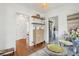 Charming dining area with a glass table, access to other rooms, and hardwood flooring at 85 Colleton Dr, Charleston, SC 29407
